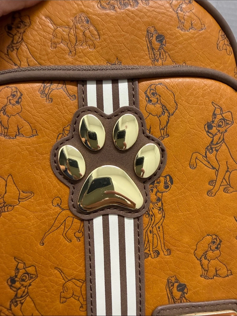 Loungefly Disney tan and brown Lady and the Tramp Paw Accent Mini Backpack